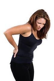 irora ẹhin kekere ninu obinrin pẹlu osteochondrosis